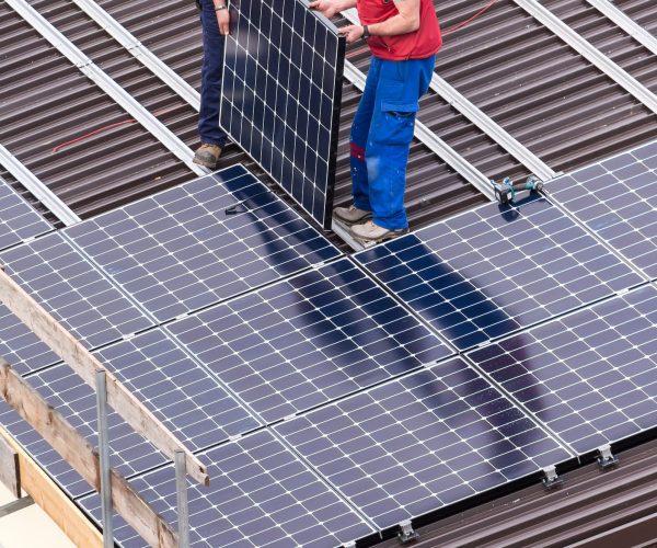Solar panel and workers.
